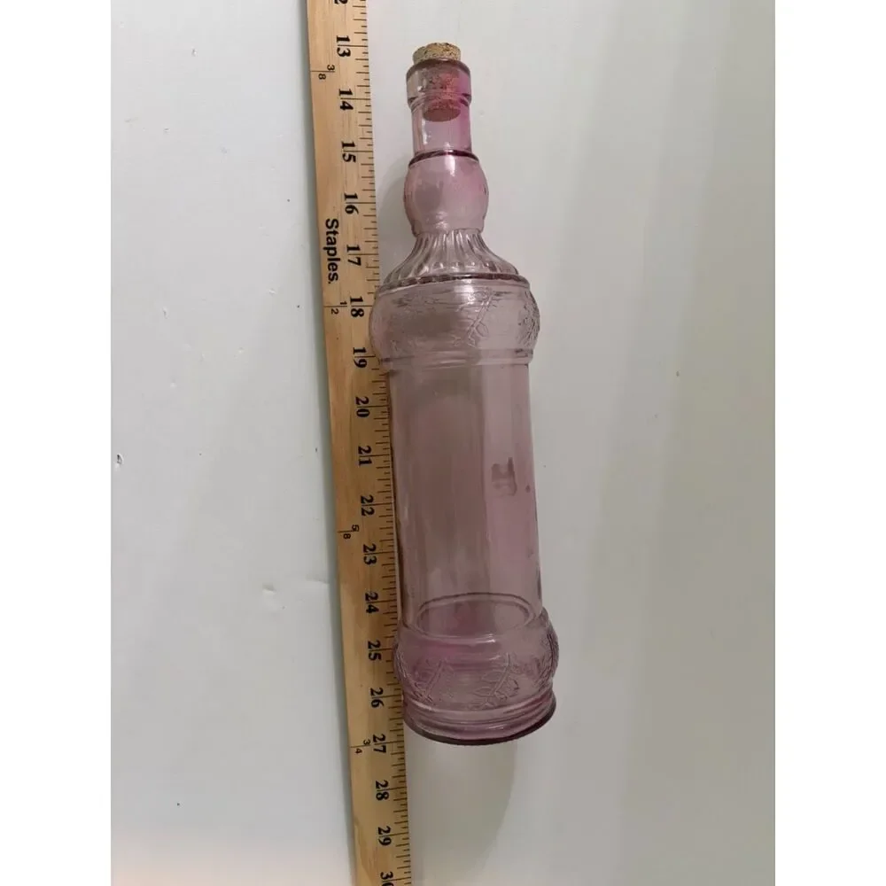 vtg Purple glass bottle with cork stopper ribbed design